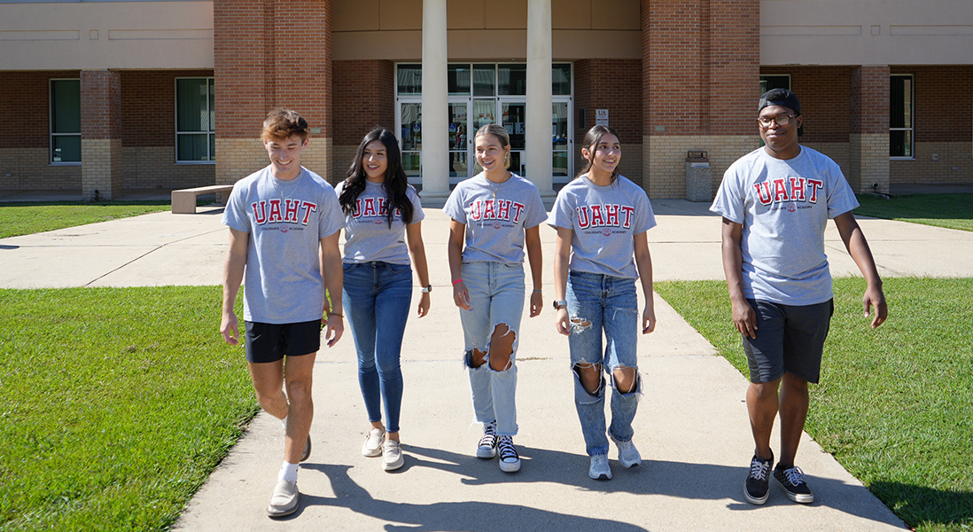 UAHT students walking across campus.