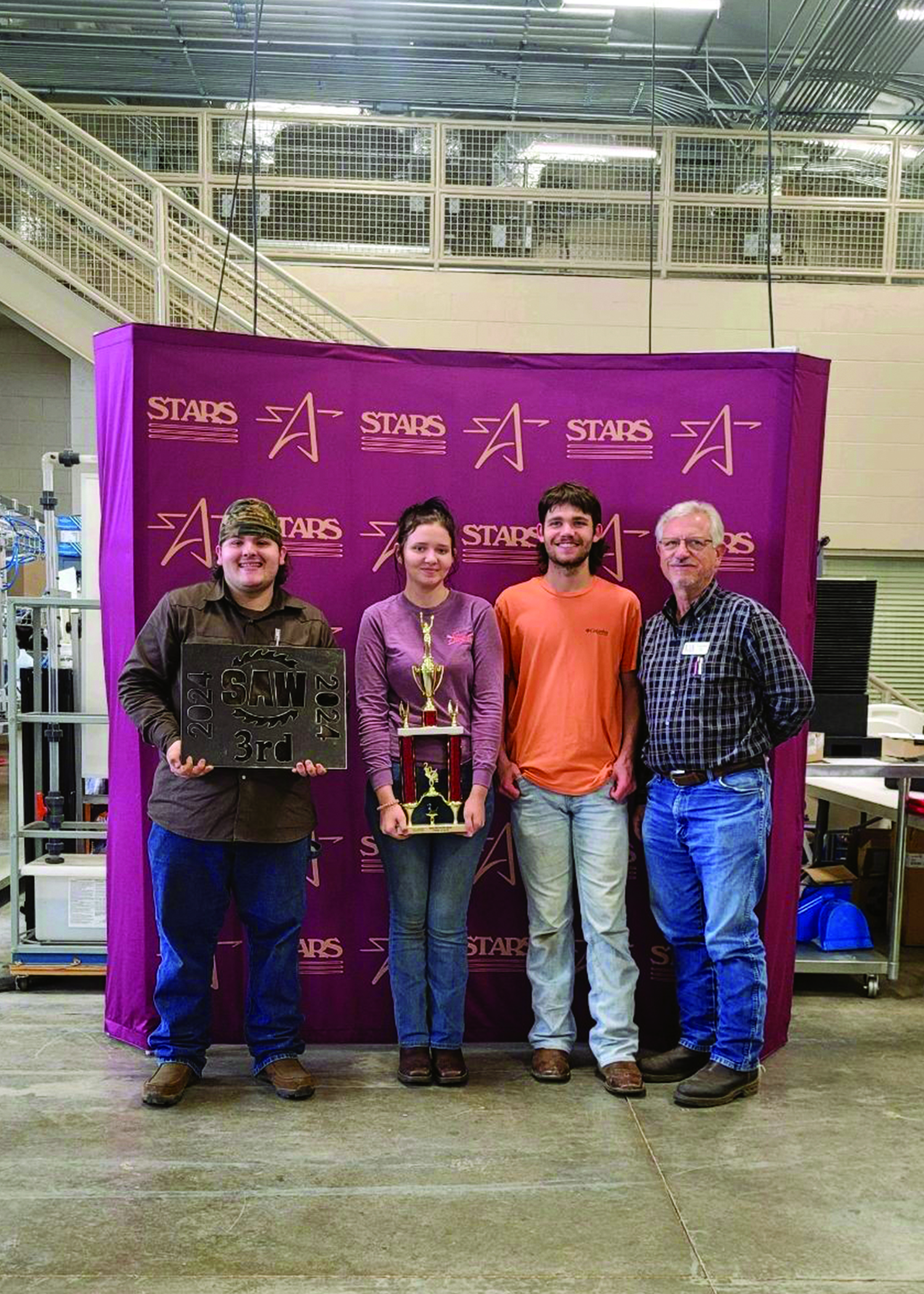 Pictured left to right: Caden Hall (Arkansas High School), Natalie Tuttle (Fouke High School), Clayton Bullard (Arkansas High School), Bob McFarland (UAHT Welding Instructor)